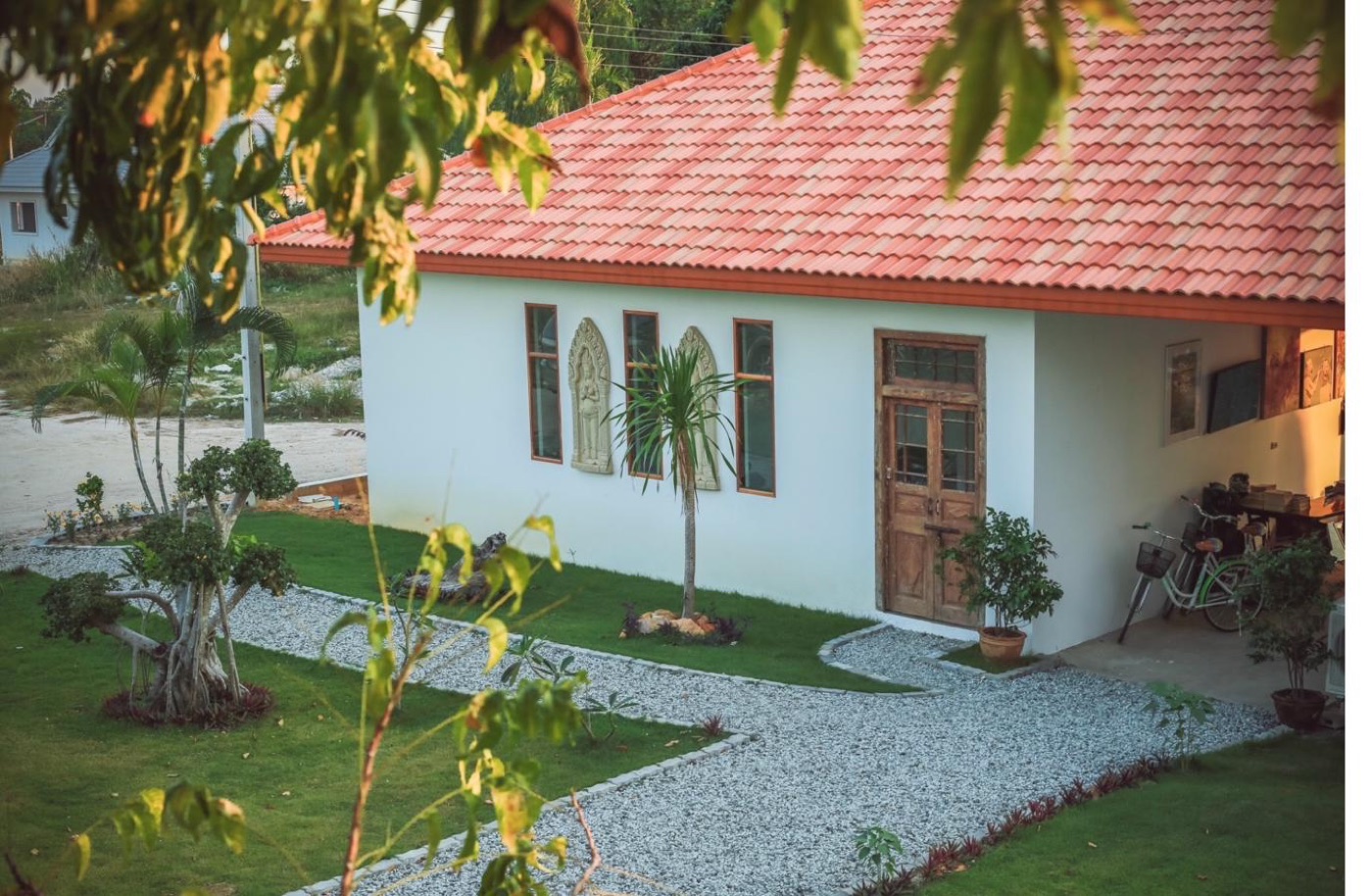 Tree Roots Retreat exterior at golden hour, Rayong, Thailand